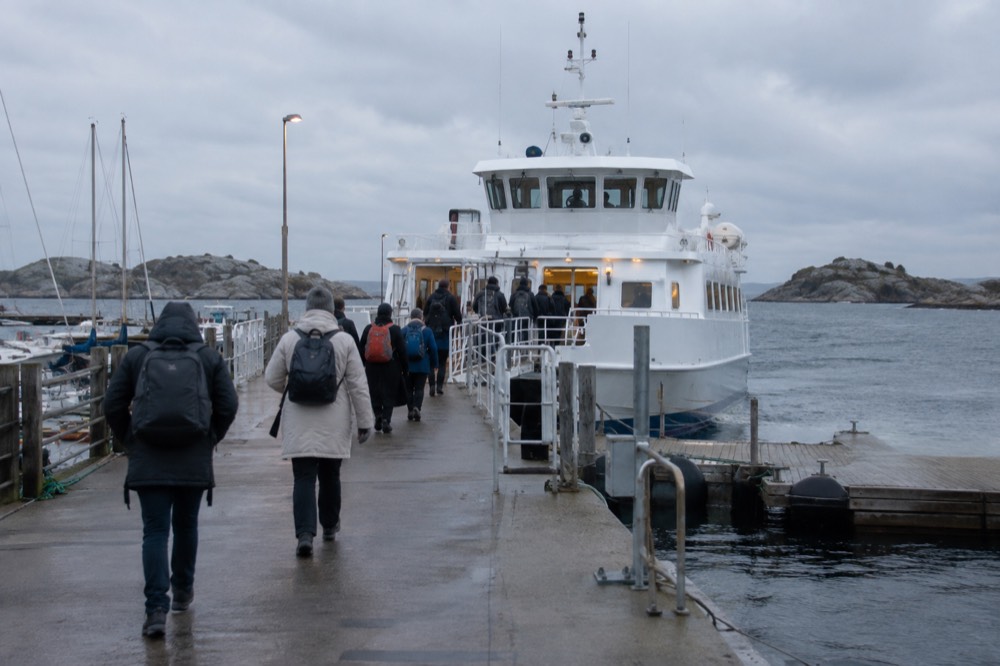 A Västtrafik archipelago ferry moored at Saltholmen pier with passengers boarding