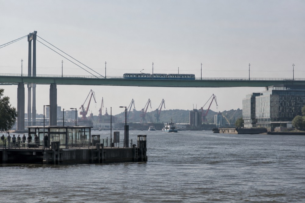 Tram crossing the Älvborg bridge over the Göta älv towards Hisingen