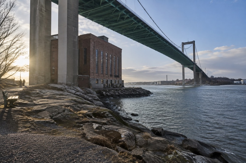 The Älvsborg Bridge rising over the Göta älv river mouth, seen from the Röda Sten district