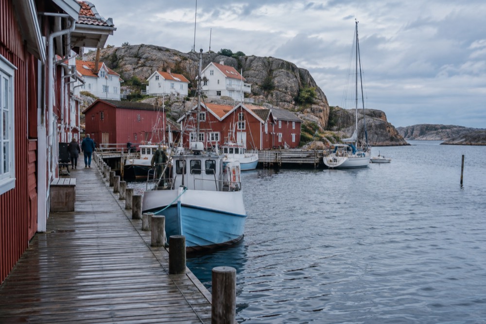 Wooden docks and fishing boats in a small Bohuslän harbour town