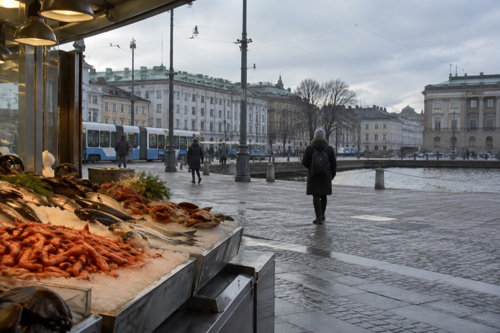 Fresh seafood displayed on ice inside a market hall in Gothenburg