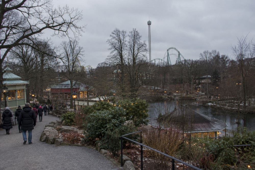 Liseberg amusement park in Gothenburg with its wooden roller coaster against a summer sky