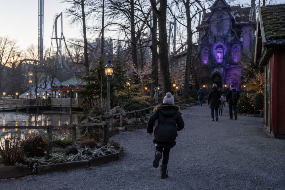 A haunted house facade lit in purple light during Liseberg's Halloween season