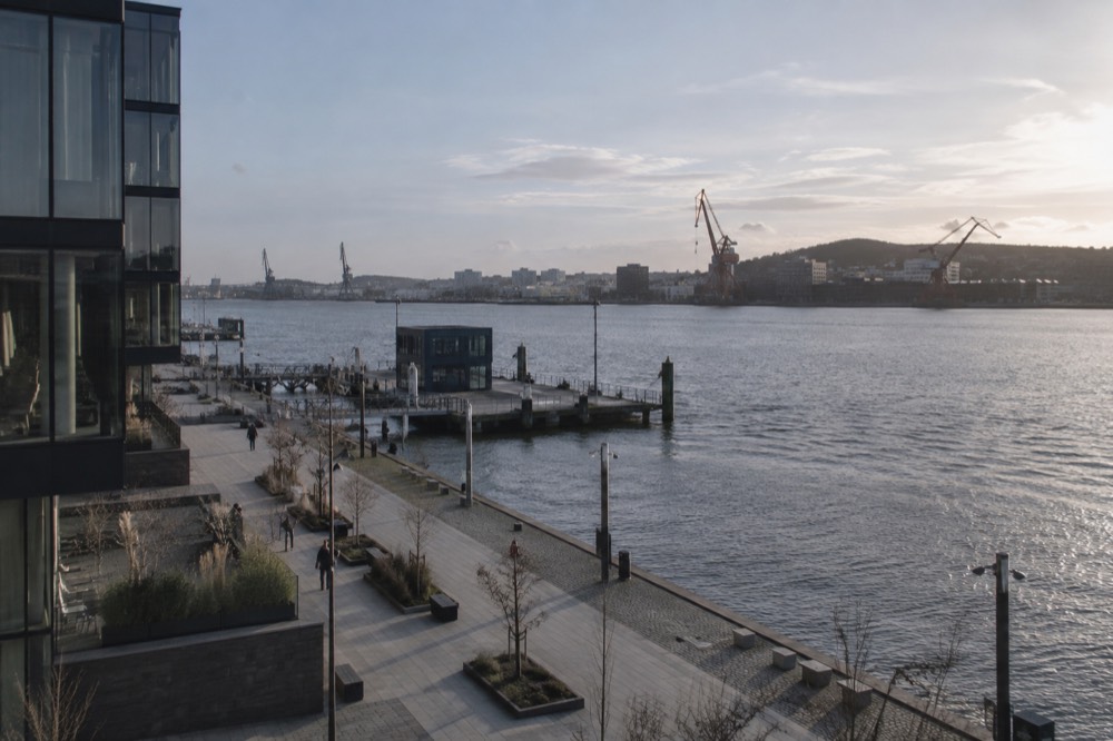 The Lindholmen waterfront promenade on Hisingen seen from above with the river beyond