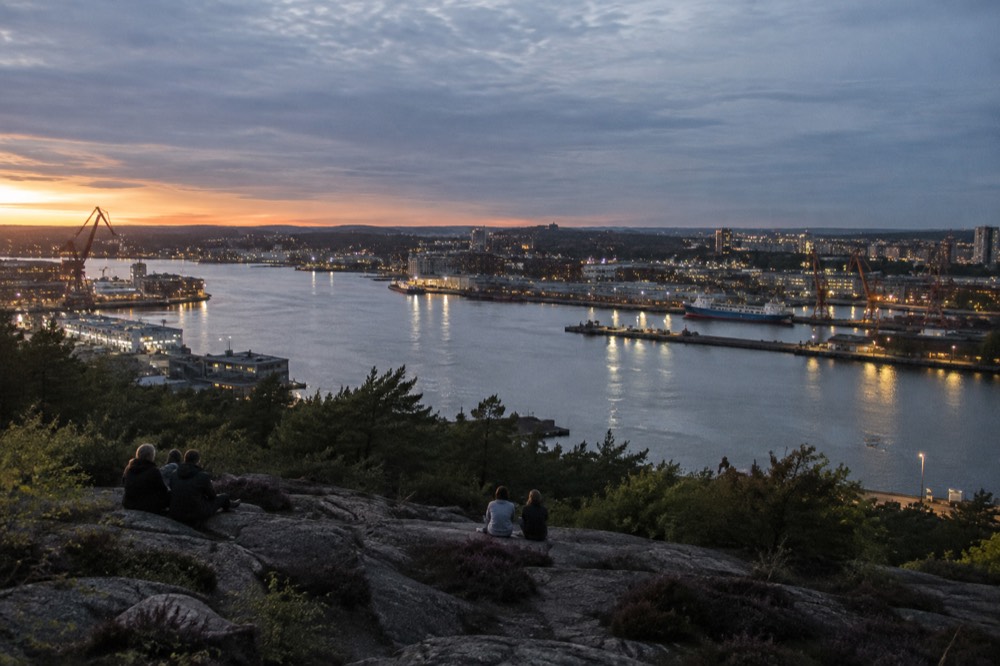 Evening view over the Göta älv and harbour lights from Ramberget after sunset