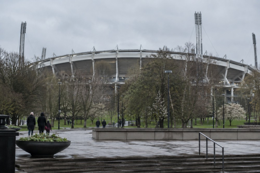 Ullevi stadium in Gothenburg seen from outside, with the arena bowl and surrounding parkland under a grey sky