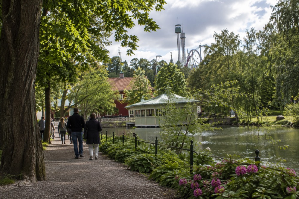 The Liseberg amusement park entrance area in Gothenburg with its towers visible above trees