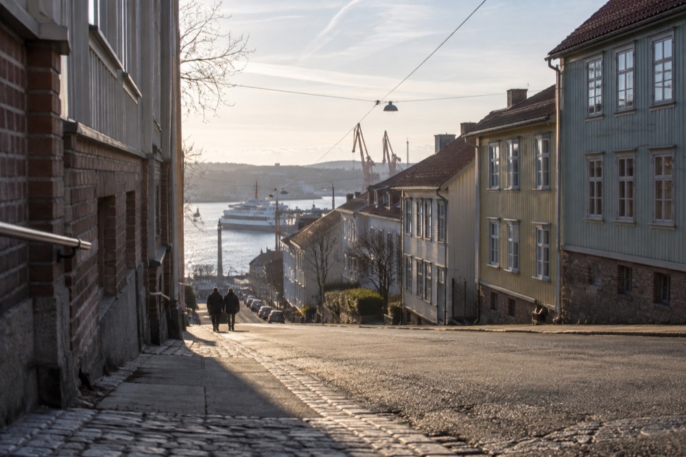 Painted wooden workers' houses and a harbour view in Majorna, Gothenburg