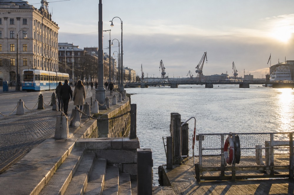 Evening light on the Göta älv river with cranes and bridge